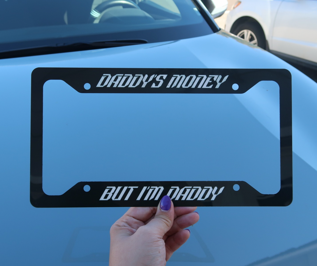 Daddy’s money, but I’m daddy license plate frame