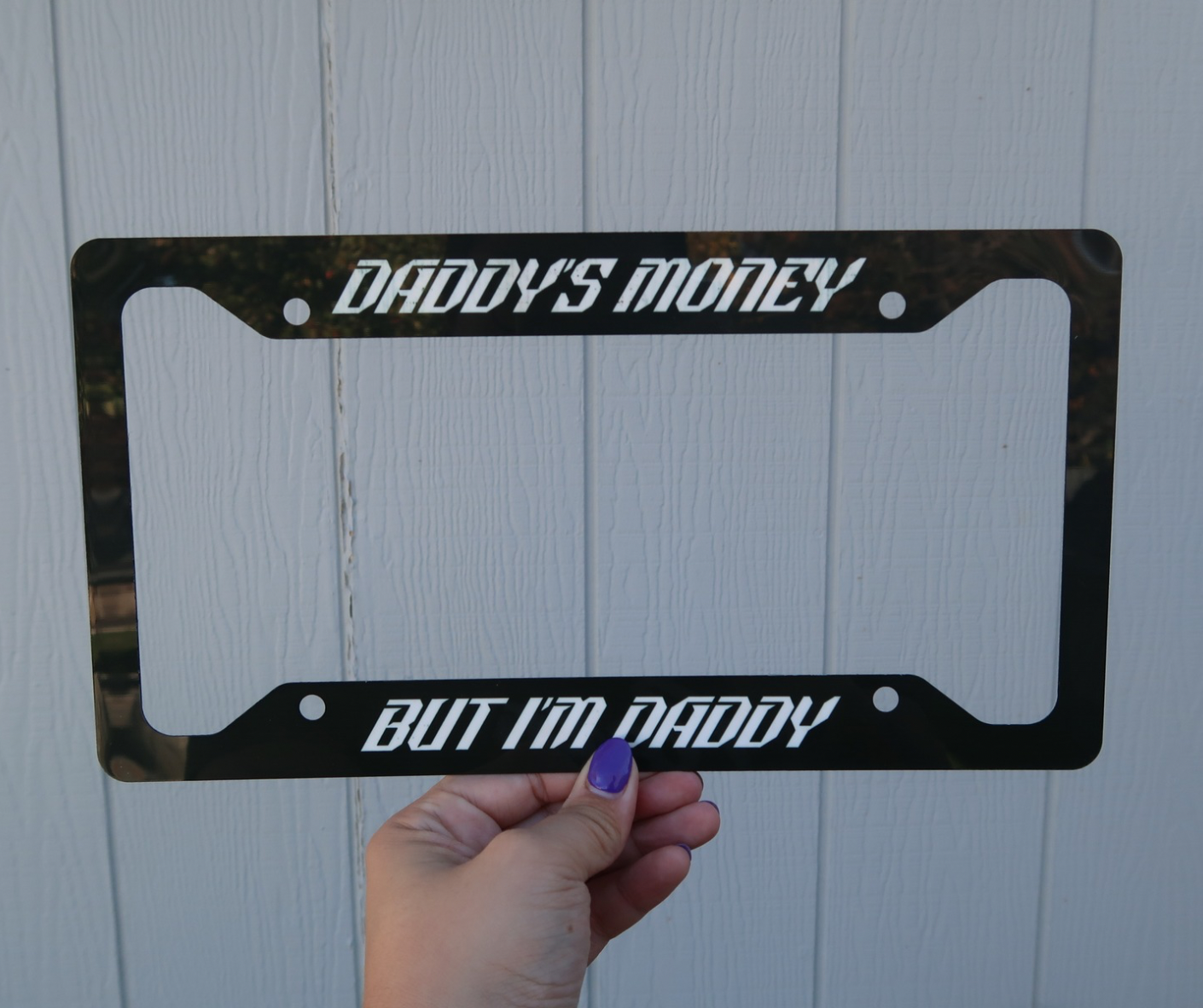 Daddy’s money, but I’m daddy license plate frame