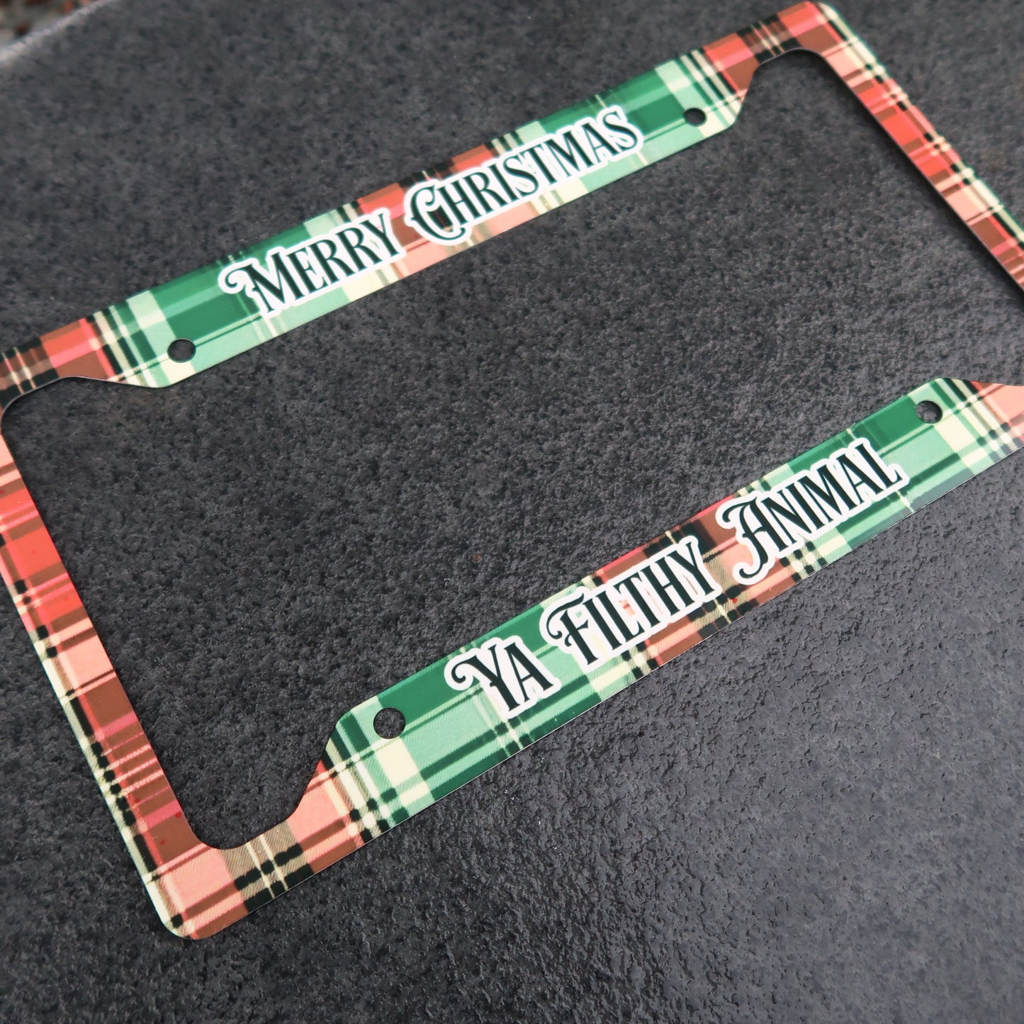 Merry Christmas Ya Filthy Animal license plate frame