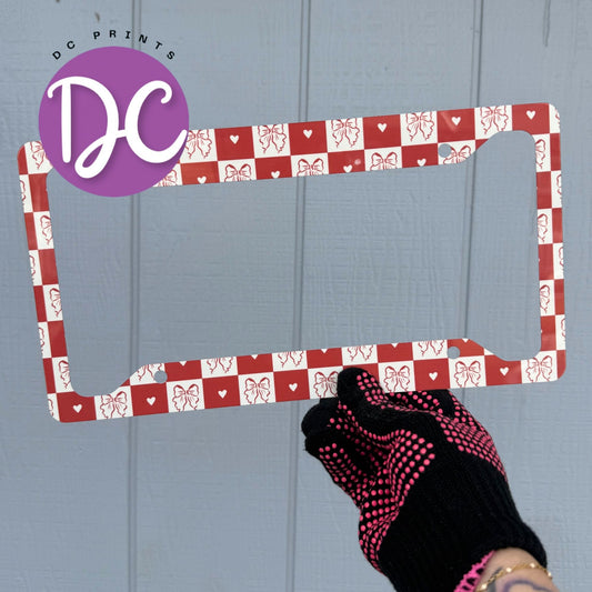 Checkered Hearts And Bows license plate frame